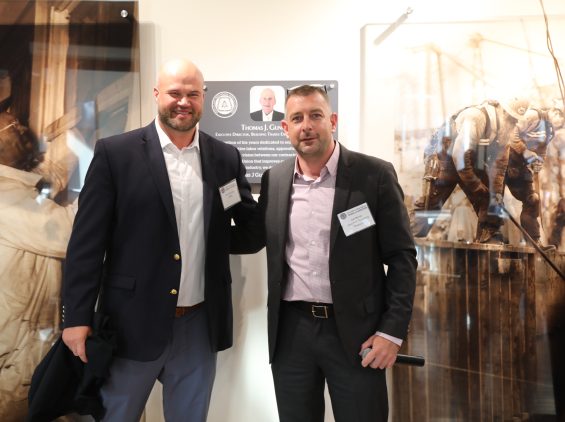 Executive Secretary-Treasurer Joe Byrne unveiled a plaque alongside Tom Gunning III and other members of the Gunning family